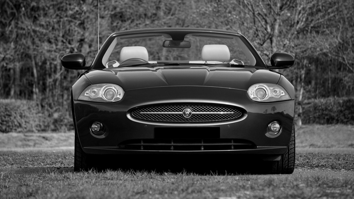 black convertible car at airport parking