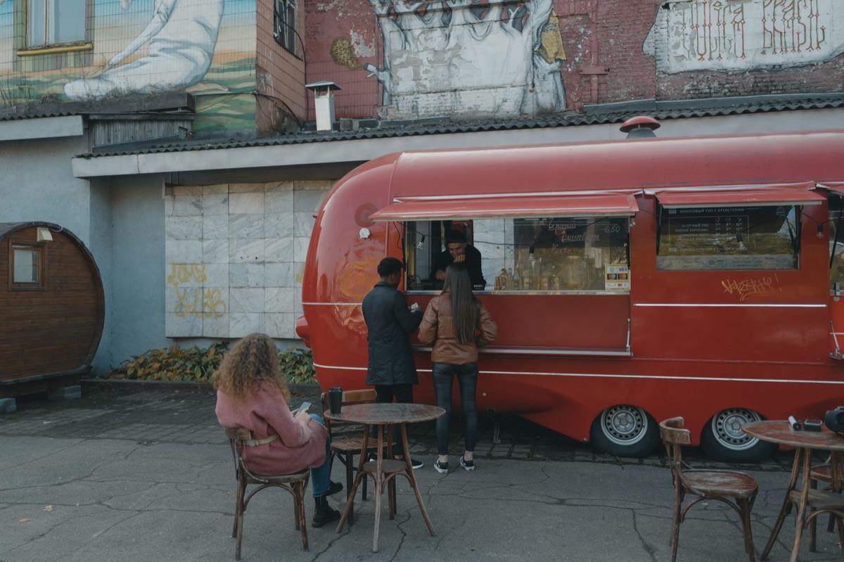 People waiting at taco truck in Los Angeles